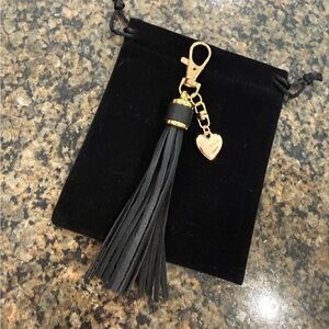 NEW. 🖤 Bag charm or keychain. Faux leather tassel, removable puffy heart charm